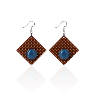milk chocolate shape with irregular blue dots handcrafted earrings on white background