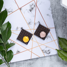Load image into Gallery viewer, dark chocolate shape design with yellow and pink dots handcrafted earrings on marble background
